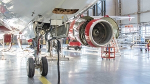 Commercial jet aircraft in hangar for maintenance